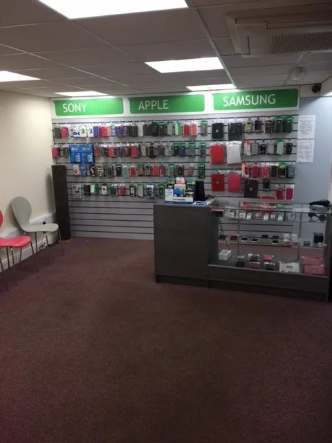 Inside The Phone Repair Shop Tarleton repair and accessories area